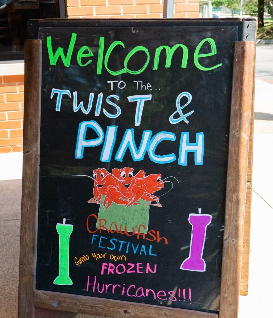 Sign for Twist and Pinch Crawfish Festival by Smashin Crab