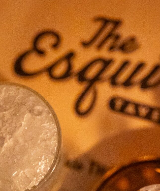 Cocktail on top of Esquire Tavern Menu