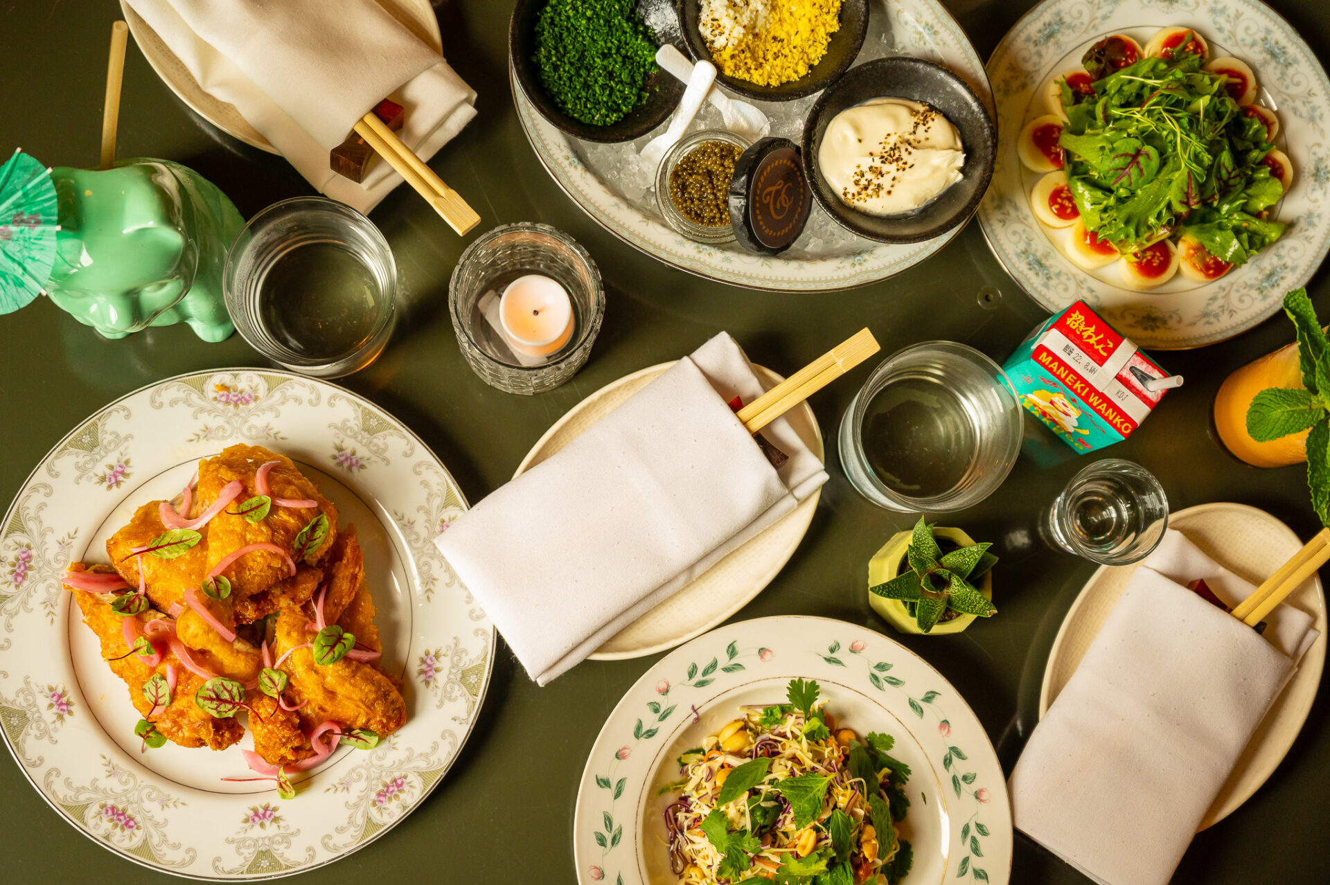 Spread of food on table at Tokyo Cowboy