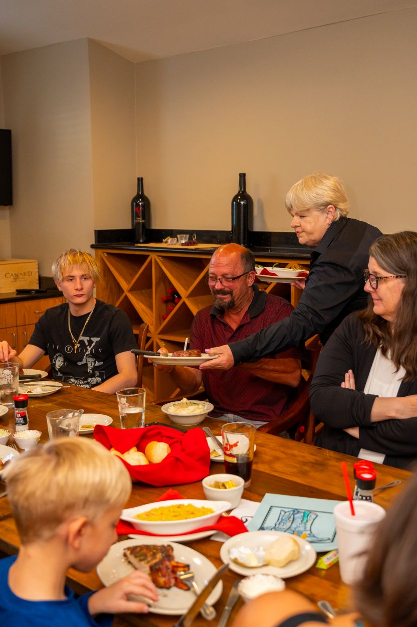 Family in Wine Room at The Barn Door